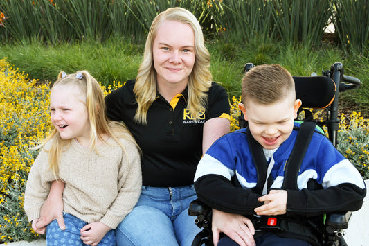 Mum with two children, one in a wheelchair