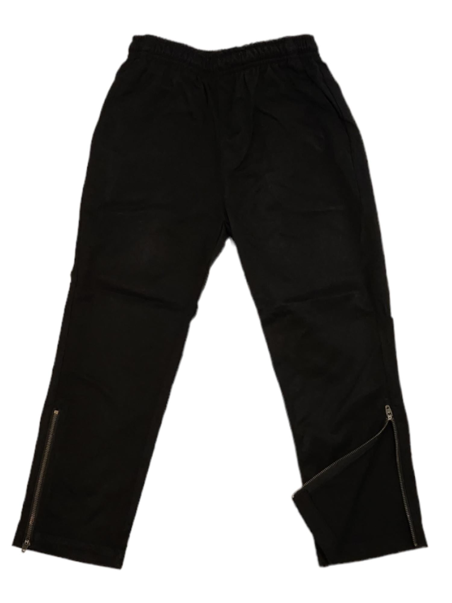 Lloyd style black cotton polyester trouser with metal zips at ankle and drawstring waist with two front pockets 